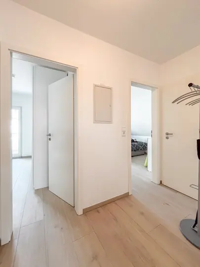 Hallway leading to the bedrooms and bathroom